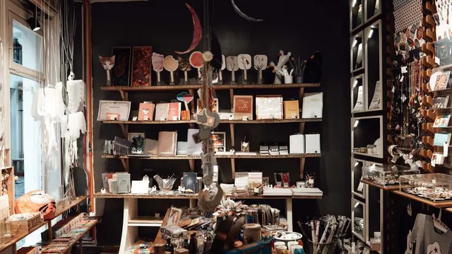 A warm interior of a souvenir shop with shelves of crafts